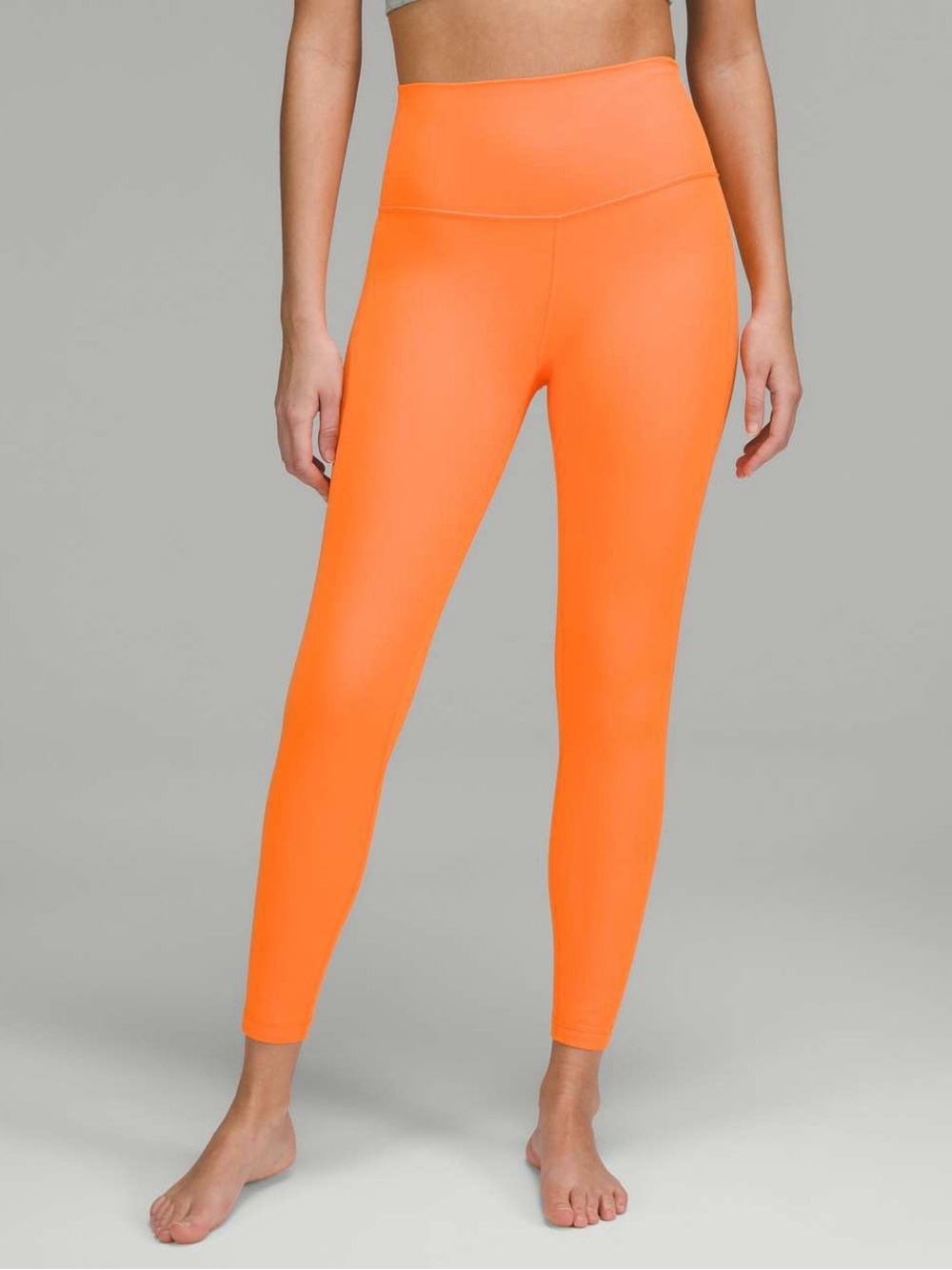 LULULEMON POWER THRU HIGH RISE TIGHT 25”- ORANGE SODA- SIZE 6